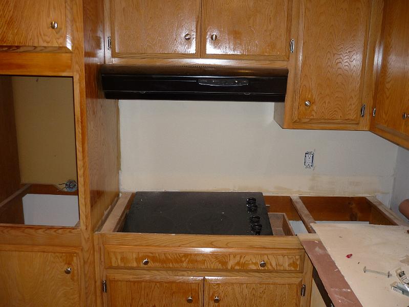 P1010103.JPG - The new hood is installed. The donated stovetop has been delivered.