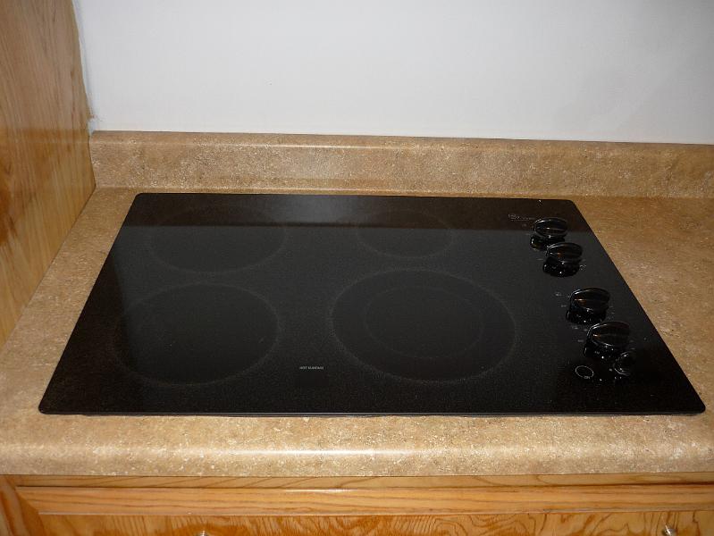 P1010141.JPG - The donated cook top looks very modern and the price was right.